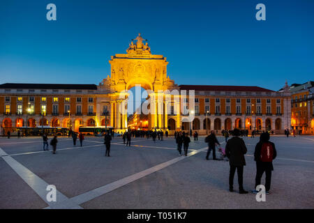 Triumphal Arch of Rua Augusta at dusk, Commerce Square. Lisbon, Portugal. Europe Stock Photo