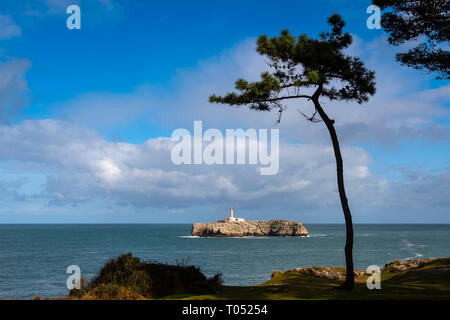 Mouro island and lighthouse from Peninsula de la Magdalena. Santander coast and Cantabrian Sea. Cantabria, Spain. Europe Stock Photo