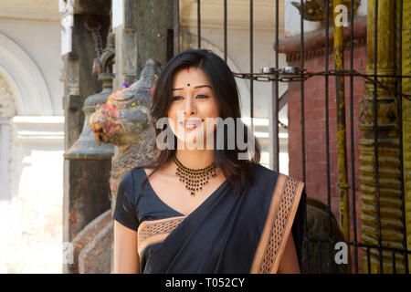 Pretty woman posing for photographer, Nepal. Stock Photo