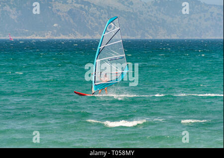 Images of Wind Surfing and Surfing in the Mediterranean Sea on brilliant green and blue waters. Stock Photo