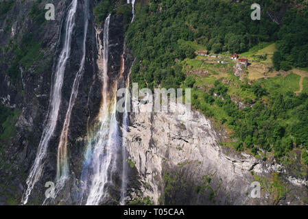 Seven Sisters waterfall in Norway. Attractions Geiranger Fjord. View of the mountain farm Stock Photo