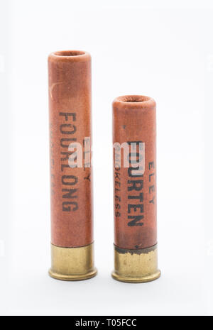 Two old, paper cased Eley .410 shotgun cartridges photographed on a white background. Collecting shotgun cartridges is a hobby that can be, for exampl Stock Photo
