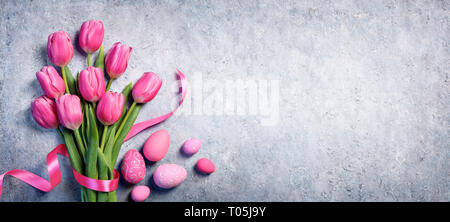 Easter - Tulips Bouquet And Eggs On Gray Background Stock Photo