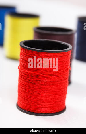 Spools of colorful thread using for needlework, embroidery and sewing Stock Photo