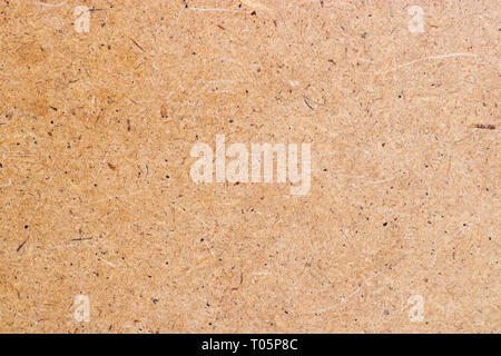 The texture of the fiberboard. Front side. Abstract background with copy space. Stock Photo