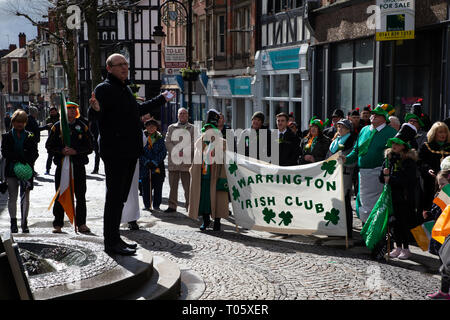 Cheshire, UK. 17th March 2019.  The annual St Patrick’s Day Parade took place, starting at 10.30 in the morning from The Irish Club in Orford Lane to ‘The River of Life’ in Bridge Street in the Town Centre, where a short service was held to remember the 25th anniversary of the Warrington Bombing Credit: John Hopkins/Alamy Live News Stock Photo