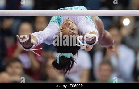 Stuttgart, Germany. 17th Mar, 2019. Gymnastics, World Cup: all-around, women in the Porsche Arena: Simone Biles from the USA gymnastics on uneven bars. Credit: Marijan Murat/dpa/Alamy Live News Stock Photo