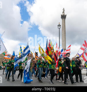 London, UK. 17th Mar, 2019. 17th March 2019. London, UK. Colourful flags representing the 26 counties in the Republic of Ireland on the annual St Patrick's day parade in Central London. Credit: AndKa/Alamy Live News