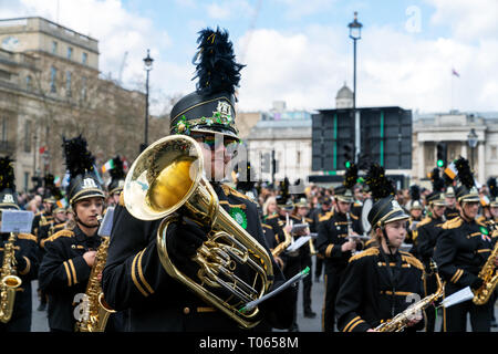 London, UK. 17th Mar, 2019. 17th March 2019. London, UK. Marching band in St Patrick's day parade through central London. Credit: AndKa/Alamy Live News Stock Photo