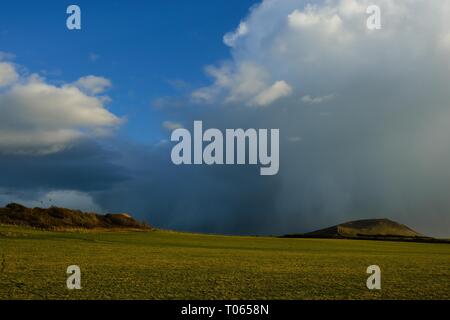 Gower Peninsula, UK. 17th Mar, 2019. UK Weather, Swansea, 17th March, 2019.  Squally showers punctuated warm sunny spells in an otherwise cold breeze at Broughton on the Gower peninsula, near Swansea. Generally warmer and drier conditions are forecast for the week ahead.  Credit: Gareth Llewelyn/Alamy Live News. Credit: Gareth LLewelyn/Alamy Live News Stock Photo