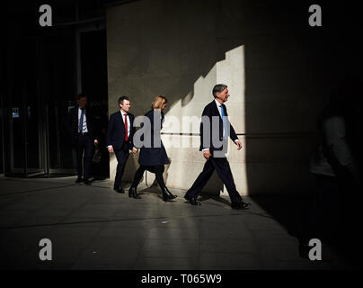 London, UK. 17th Mar, 2019.    Guests Leave  the BBC after of their appearance on The Andrew Marr Show.  Broadcasting House, London. UK Philip Hammond and his Entourage leave the BBC Credit: Thomas Bowles/Alamy Live News