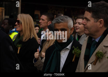 London, UK. 17th March, 2019. Mayor of London, Sadiq Khan, with a green scarf, walks at the front of the St Patrick's Day Parade London near Piccadilly, UK, today. Credit: Joe Kuis / Alamy Live News Stock Photo