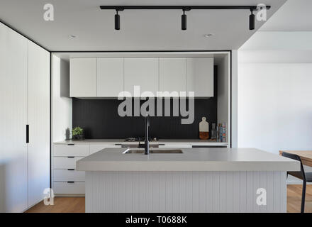 Display apartment kitchen. Summer Hill Flour Mill, Summer Hill, Australia. Architect: HASSELL, 2019. Stock Photo