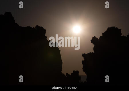 The morning sun creating silhouettes of the tufa towers in the South Tufa Area, Mono Lake, Mono County, California, America Stock Photo