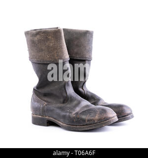 Kirza boots on white background, retro boots, made of artificial leather, used in Soviet Union for soldiers in the army and for work Stock Photo