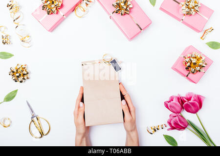 Download Frame of paper hand bag with flowers amaryllis and peonies ... Yellowimages Mockups