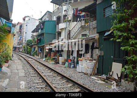 Hanoi, Vietnam - 14th December 2017. Houses on a residential street which is often referred to as Train Street in central Hanoi which has grown up aro Stock Photo