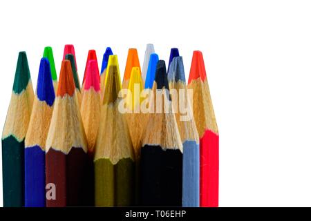 Background of colored pencils for creativity. Close up of an assortment of colored pencils tips on white background. Background of colorful pencils Stock Photo