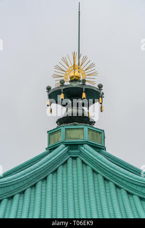 Taito-ku, Tokyo - July 27, 2017: Roof detail of Shinobazunoike Benten-do temple which enshrines the goddess benzaiten. Located in Ueno Park Stock Photo