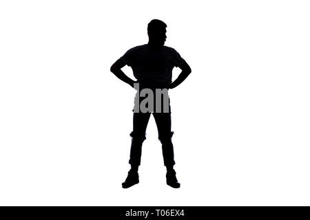 Silhouette of a young man who's doing breakdance Stock Photo