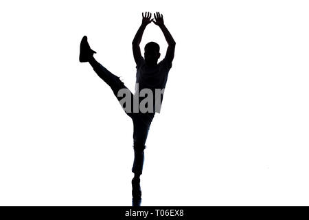 Dancer doing breakdance on white background Stock Photo