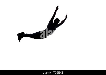 Man in studio is doing freeestyle breakdance Stock Photo