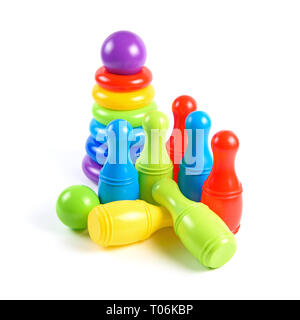 Colorful Plastic Skittles and Pyramid Toys Isolated on White Background Stock Photo