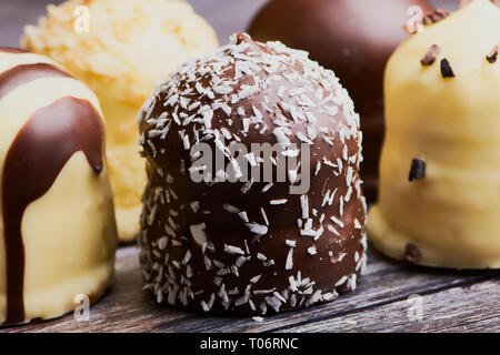 group of white and dark chocolate covered marshmallows, macro color image Stock Photo