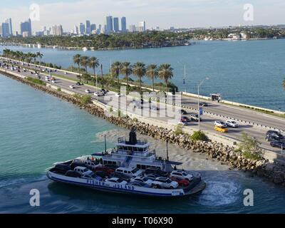 Ferry carrying vehicles to Fisher Island in Miami, Florida Stock Photo ...