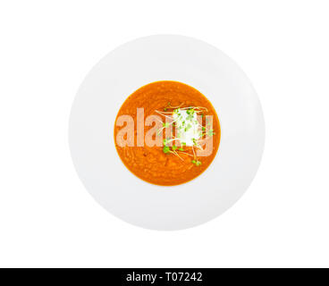 Vegetarian pumpkin soup puree with cress salad greens. Studio Photo Stock Photo