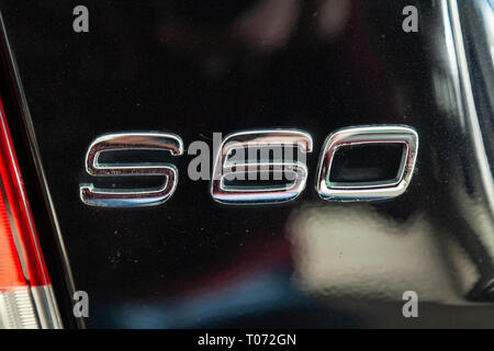 Novosibirsk, Russia - 08.01.18: Rear emblem view of black used Volvo S60 car stands in the auto showroom sale after washing Stock Photo