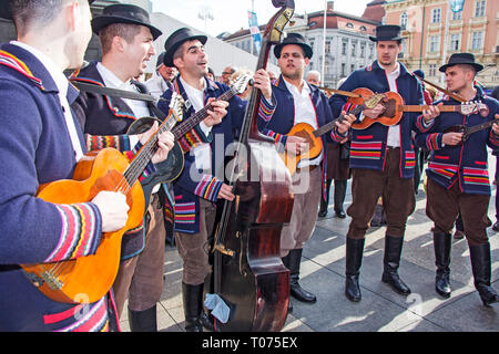 ZAGREB, CROATIA - FEBRUARY 15, 2019: Croatian musicians in traditional Slavonian costumes, play on Ban Jelacic Square in Zagreb, Croatia. Stock Photo