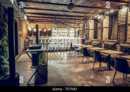 Interior shot of modern bar being decorated in loft style Stock Photo