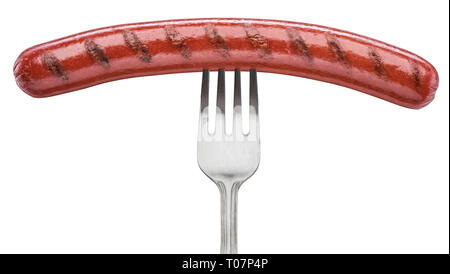 Grilled sausage on a fork. File contains clipping path. Stock Photo