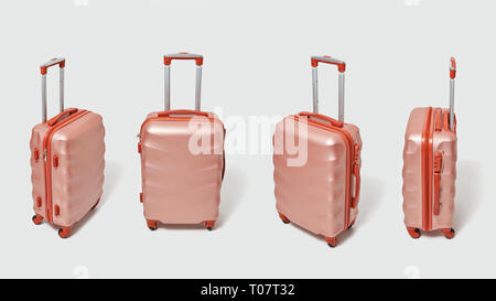 Set of modern brown travel suitcases presented on a gray background with copy space. Tourism concept. Stock Photo