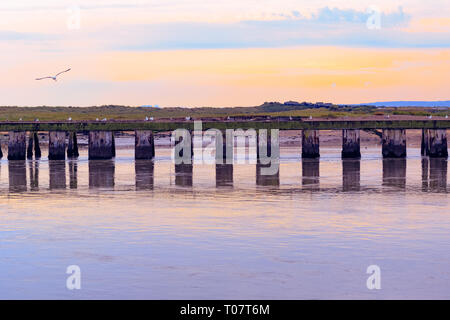 Purple sunset at the junction of River Blyth and Dunwich River in Southwold, a popular seaside town of the UK Stock Photo