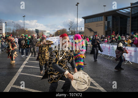 African community in traditional Nigerian costumes celebrating St. Patrics Day on a parade in Dublin, Blanchardstown Stock Photo