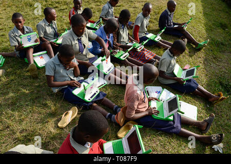 RWANDA, Ruhengeri, Primary school, Initiative One laptop per child OLPC founded by Nicholas Negroponte, digital education for children using a XO laptop, the so called 100 Dollar computer - digitalization Stock Photo