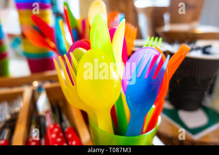 Colourful child safe plastic cutlery Stock Photo