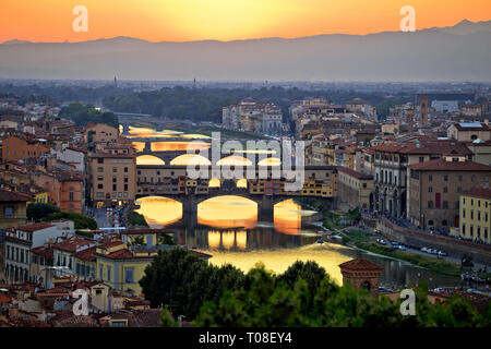 Florence cityscape and Arno river bridges sunset view, Ponte Vecchio, Tuscany region of Italy Stock Photo