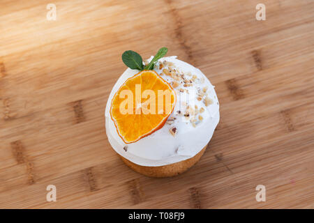 Easter, Easter cake on wooden background with a complex composition, beautiful scenery, dried fruits Stock Photo