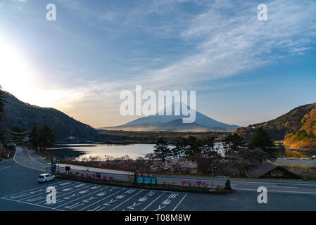 Landscape of Mount Fuji with natural fine sand flying up in the air. The World Heritage. view at Lake Shoji ( Shojiko ) in the morning. Fuji Five Lake Stock Photo