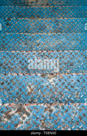 Top view at old blue metal stairs backdrop Stock Photo