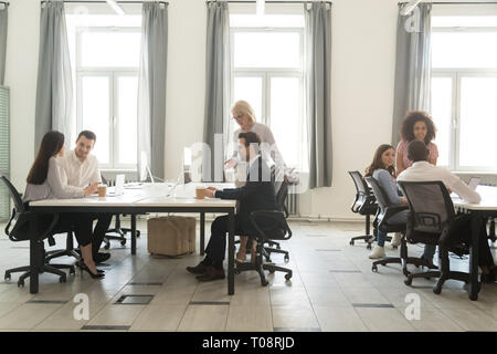 Modern office interior with business team people working on computers Stock Photo