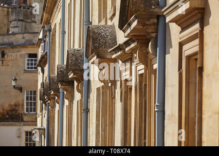 The facades of historic stone town houses in Bath, Somerset, Great Britain. Stock Photo