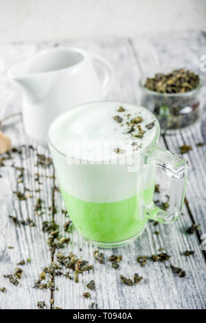 Tea latte, Hot Tokyo Fog Tea Drink with Foamed Milk and Matcha, wooden background copy space Stock Photo