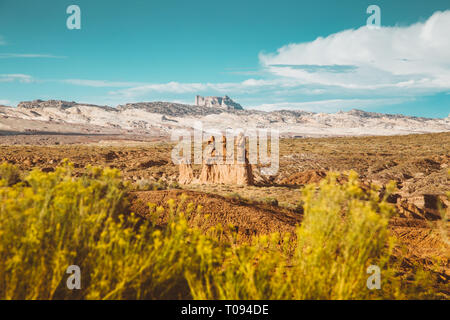 Panoramic view of beautiful desert landscape with hoodoos sandstone formations in Goblin Valley State Park at sunset, Utah, USA Stock Photo