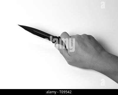 Close up of soldiers hand holding knife on his back belt at Civil