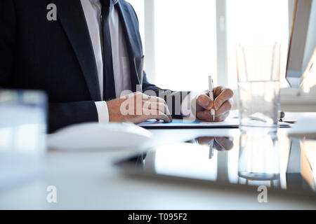 Making notes on paper Stock Photo
