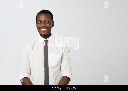 Cunning tricky african mature man thinking looking aside. Stock Photo